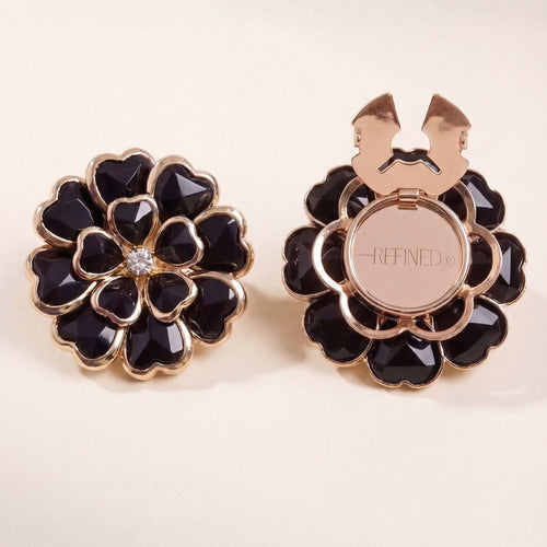 Refined by JV Camélia button covers in black with gold-tone finish and central crystal, shown front and back view.