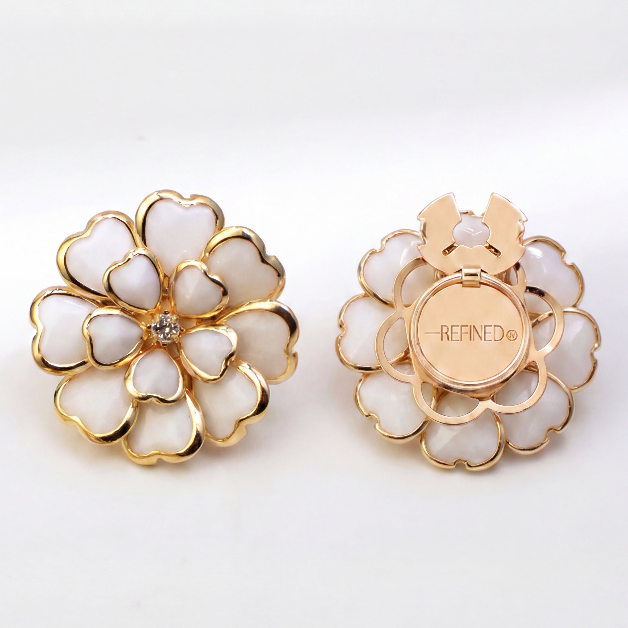 Refined by JV Camélia button covers in gold-tone with white floral petals and a central crystal accent.