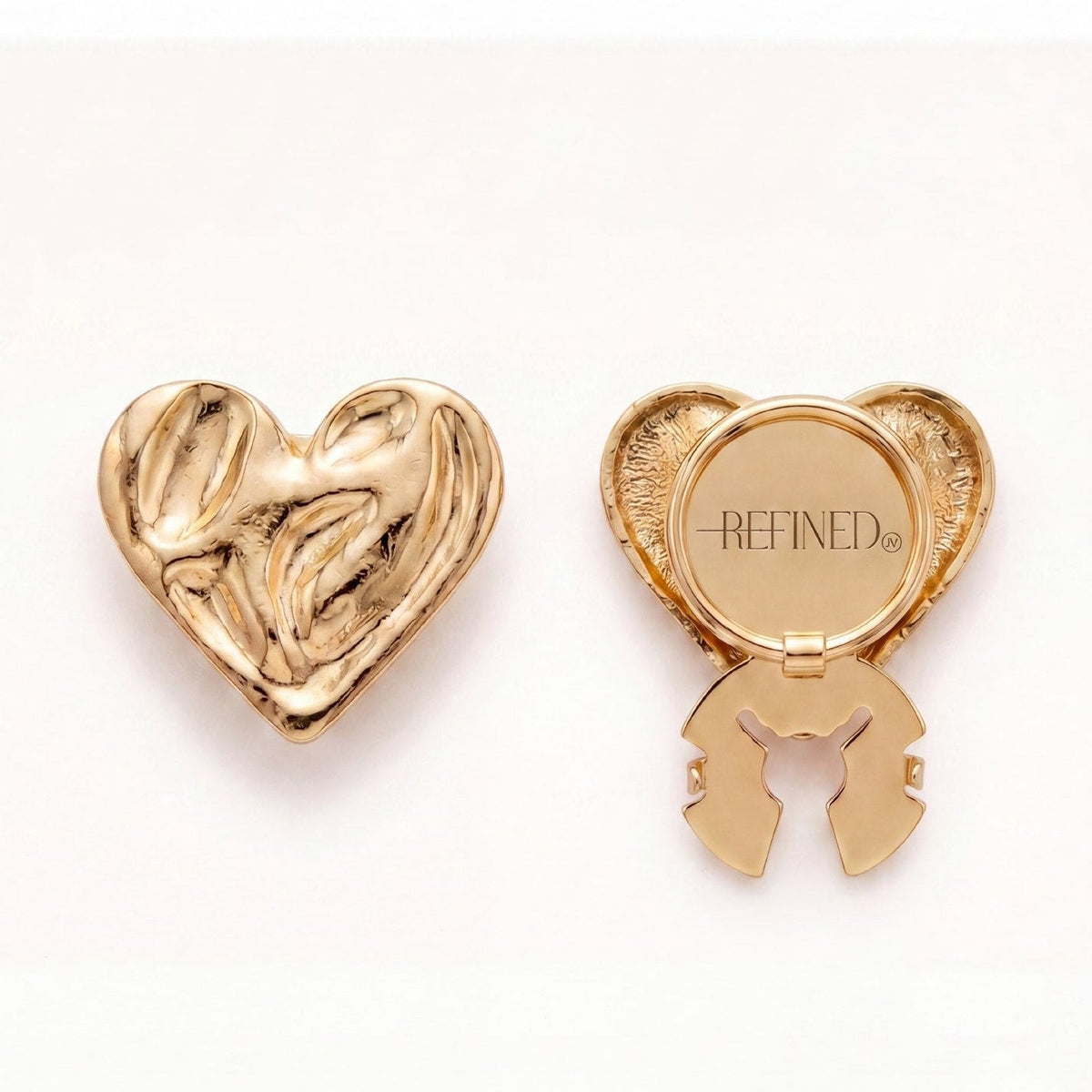 Refined by JV gold-tone heart-shaped button covers with a textured finish and clip mechanism for easy attachment.
