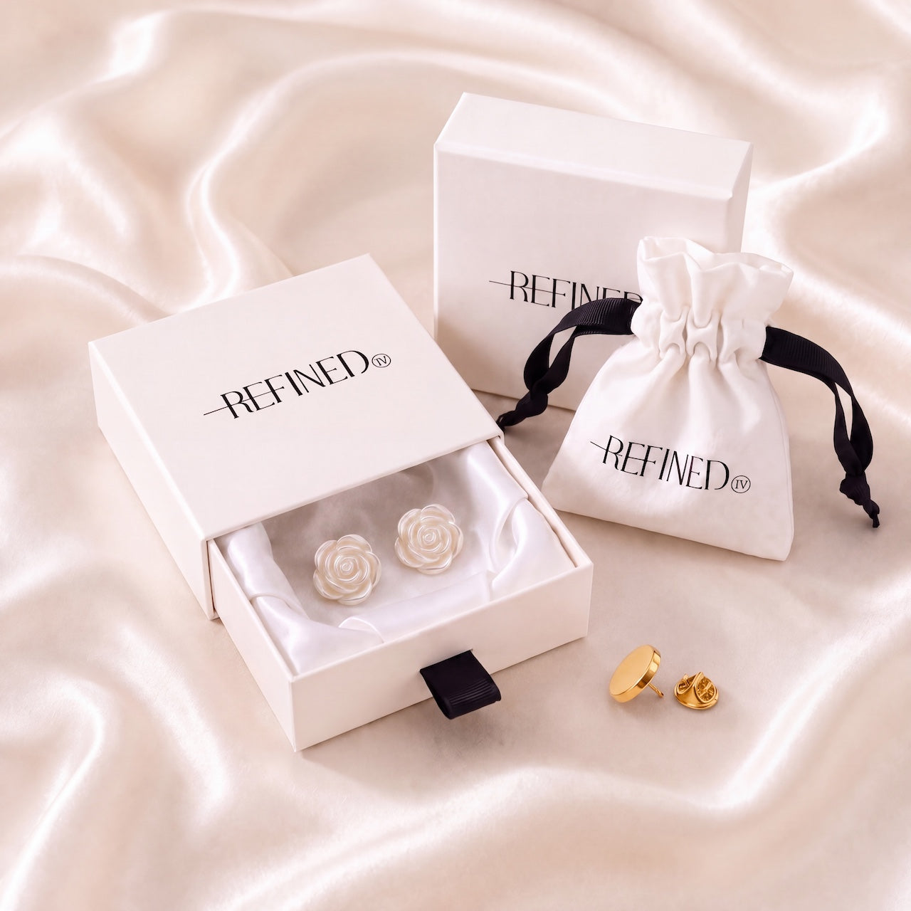 Refined by JV Ivory Rosé button covers with gold-tone finish and pin, presented in a signature gift box and pouch.